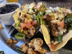 Roasted cauliflower tacos which came with black beans.   at Annapurna's World Vegetarian Cafe in Santa Fe