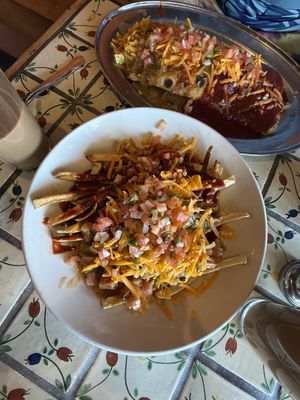 Fries with masala sauce and cheese   at Annapurna's World Vegetarian Cafe in Santa Fe