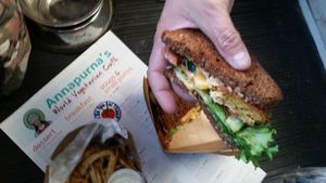not a fan of cheese on a Falafel sandwich at Annapurna's World Vegetarian Cafe in Santa Fe