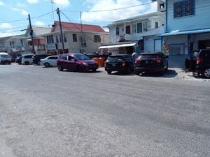 While building on middle st. Next to the pharmacy (blue building seen here located on the corner of east and middle st.) at Juice Power in Georgetown