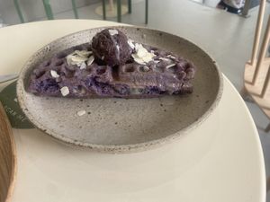 Taro waffles, filled with a mochi. Very tasty and fluffy. Not too sweet.  at Tea Stories in Amsterdam