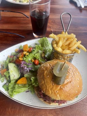 Burger with a salad and chips  at The Lookout Cafe in Victoria Falls