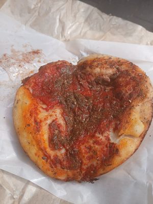 Round marinara pizza slices (€2) at Panificio Coppola Antonio in Naples