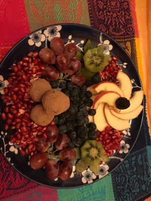 Vegan chocolate truffle and fresh fruit plate at Crystal Woods Retreat in Wilkesport
