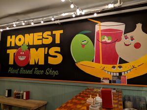 Indoor signage at Honest Tom's Taco Shop in Philadelphia