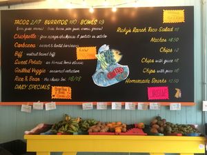 Menu and fresh fruit at Honest Tom's Taco Shop in Philadelphia