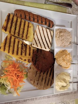 Polenta seitans sauces at La Lanterna in Verona