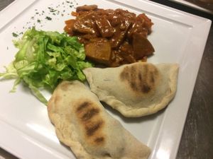 Brasato di seitan alla sudafricana con panini alla griglia ripieni ai carciofi at La Lanterna in Verona