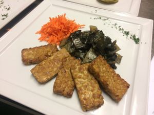 Tranci di tempeh alla piastra con bieta costa al cumino at La Lanterna in Verona