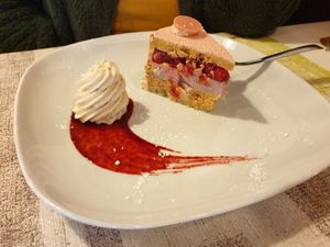 Pink cake with red currents, white chocolate and pine seeds at La Lanterna in Verona