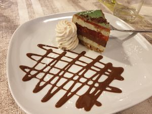 Green macha cake with papaya, dark chocolate and pecan nuts at La Lanterna in Verona