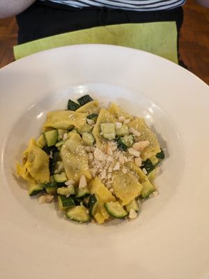 PLIN STUFFED WITH SMOKY SEITAN AND SPRING ONION, SAUTEED WITH COURGETTES AND MACADAMIA FLAKES at La Lanterna in Verona