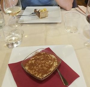 Dessert: top is chocolate/banana/cococut cheesecake, bottom is tiramisu at La Lanterna in Verona