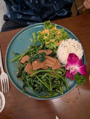 Vegan 'beef' stir fried with morning glory at De Tham Restaurant in Ho Chi Minh City