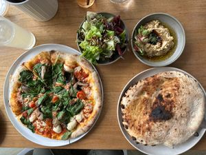 Vegan mushroom pizza, flatbread and hummus, salad at The Colourpatch  in Augusta