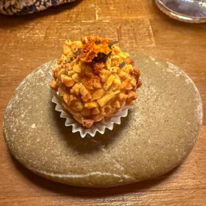 Ferrero Rocher of dried tomato, almonds, olives and sea fennel  at Bistro Esencia in Mallorca