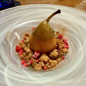 Organic roasted pear with saffron and star anise and Mallorcan almonds, orange and pink pepper crumble  at Bistro Esencia in Mallorca