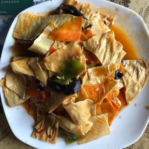 Roasted tofu skin with fungus at Happiness Vegetarian in Kathmandu