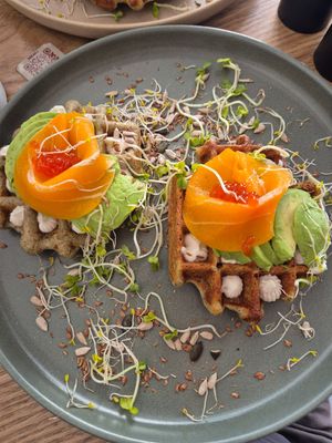 Waffles with salmon, avocado and red caviar at Not Guilty Pleasure in Munich