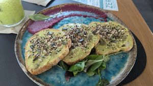 Avo toast with a green smoothie at Zero in Naples
