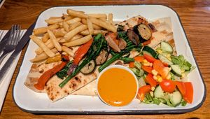 Chargrilled Vegetable Skewer. Served with stonebaked flatbread, Chopped salad, fries. at Bagle Brook - Beefeater in Port Talbot