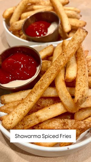 Best fries around called (Shawarma spiced) served with spiced ketchup and tahini sauce.  at Ibiza in Santa Cruz