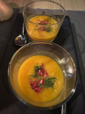 Mango puree with rum topped with pomegranate and chopped mint.  at MEZZE in Granada