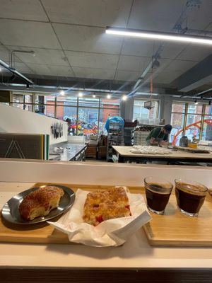 Tomato focaccia and vegan pain au chocolat at Companio Bakery in Manchester