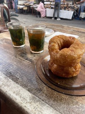 Sfenj with sugar and mint tea   at Sfenj Boulabada in Marrakech