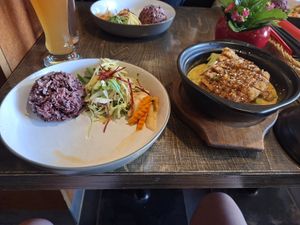 Crispy seitan curry with black rice and vegetables. Number 55 in the menu. at Mom's - Vegan Cooking in Berlin