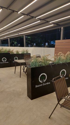 Outside at Secret Garden Restaurant and Bar 贡茶 in Belize City