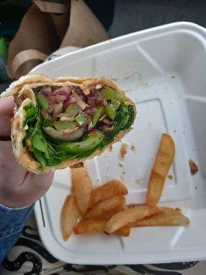 Humus vegetable wrap with fries from the deli. They offer a few vegetarian hot sandwiches that can easily be made vegan at Chuck's Produce and Street Market - Salmon Creek in Vancouver