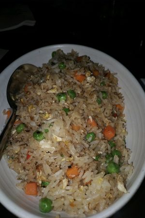 vegan fried rice however they added eggs  at Wild Ginger in Seattle