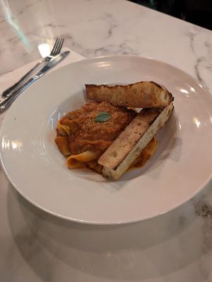 Pappardelle Bolognese w toasted [extra] focaccia bread at Bellona Kitchen and Bar  in Toronto