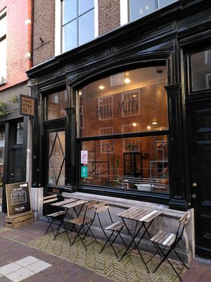 Street side, also seating area indoors at Hills and Mills in Delft
