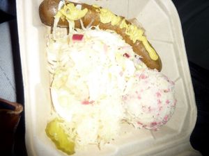 Vegantoberfest  brats with potato salad & sauerkraut; best Oktoberfest meal ever at BBQ Revolution in Austin