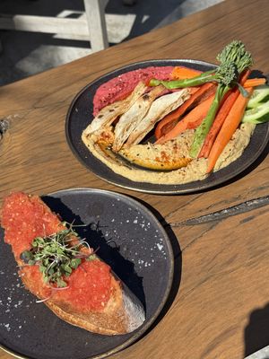 Tomato bread and hummus plate   at Golden Buddha in Ibiza