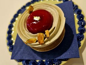 Pistachio raspberry tartlet at Chez Fritz in Vienna