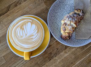 Latte and Almond Croissant  at The Hungry Plum in Herne Bay