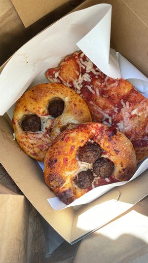 Pizza margherita and pizza with meat balls  at The Sanctuary - PBerg in Berlin