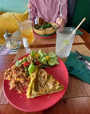 A delicious hot quiche with very tasty, health-giving salad. at Vegan Chouke in Brussels