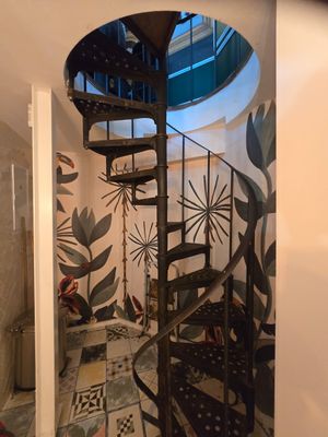 Very narrow and steep spiral stairs to toilets at Vegan Chouke in Brussels
