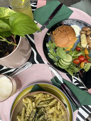 Pasta of the day (green pesto) & No chicken burger 🌞 - we can really recommend this place! For Coffee, Food & something sweet - really good, we came here everyday at lunch time! at Vegan Chouke in Brussels