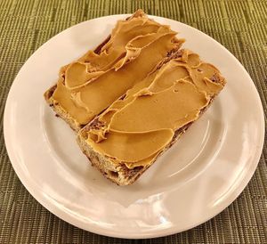 Toasted wholemeal baguette with peanut butter  at Mistral  in Dubai