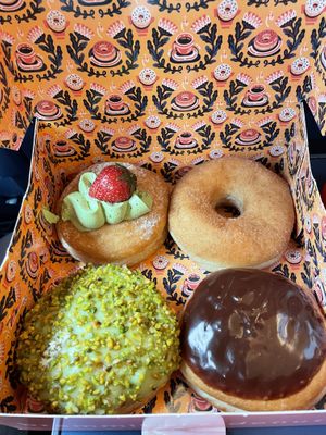 Strawberry matcha, cinnamon, Boston cream and pistachio  at Brammibals Donuts - Europlatz in Berlin