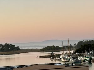 Take a walk around the 360-degree outdoor balcony for a beautiful sunset view of Humboldt Bay and Marina  at RoofTop in Eureka