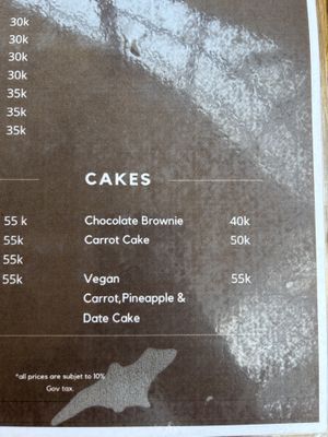 Menu with a vegan cake  at Milk Espresso in 
