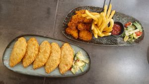 Vegan khuushuur and vegan chicken nuggets at Agnista Restaurant - Tara Center in Ulaanbaatar