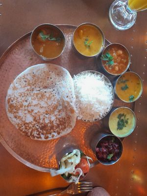 Slim thali with kallappam instead of bread (rice + coconut pancake) at Herb  in Leamington Spa