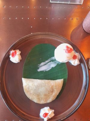 Ela adda with vegan ice cream (rice pancake stuffed with jaggery and dried fruits) at Herb  in Leamington Spa